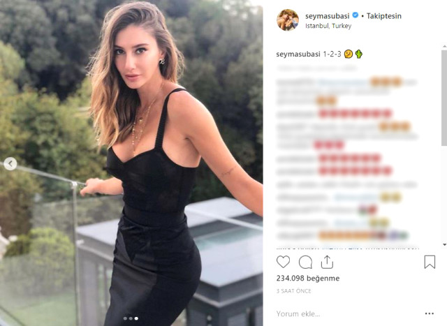 seyma-subasi-elbisesinin-etiketini-unutunca-11228143_4924_m.jpg