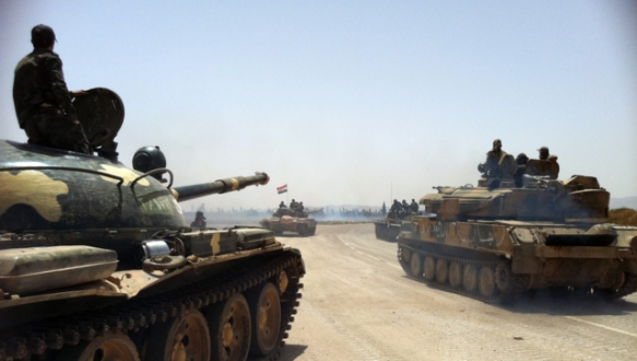 Suriye ordusu ülkenin en büyük kenti Halep`i tamamen kuşatmak üzere.