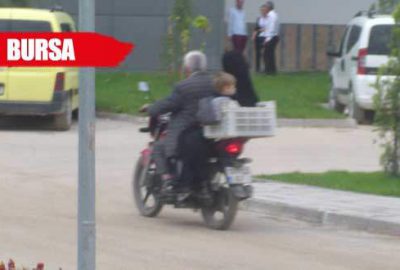 Motosiklet sepetinde tehlikeli yolculuk