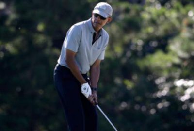 Obama golf oynayıp kitap okuyor