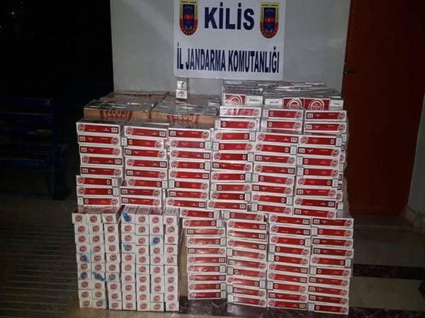 Kilis'te, jandarmanın şüphelenerek durdurduğu araçta 11 bin 990 paket kaçak