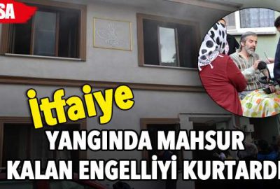 Yangında mahsur kalan engelliyi itfaiye kurtardı