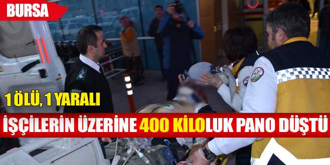 İşçilerin üzerine 400 kiloluk pano düştü