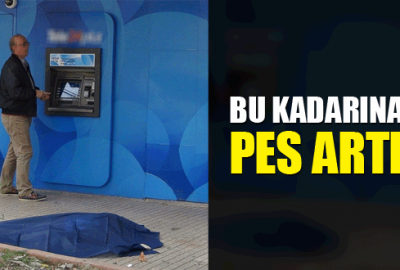 Yerdeki cenazeye rağmen ATM’den para çektiler