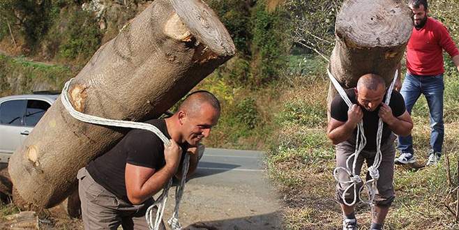 Rizeli ‘Rambo’ 203 kiloluk kütüğü taşımayı başardı! Rize’de 'Rambo' lakaplı Ramazan Çepni, 203 kilo ağırlığındaki kütüğü sırtında