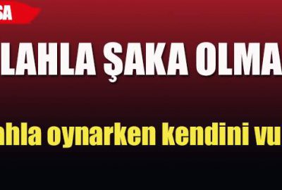 Silahla oynarken kendini vurdu!