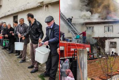 Yangını söndürmek için kovalarla su taşıdılar