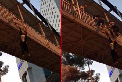 Uyuşturucu kullanan kız, üstgeçitten atlamak istedi