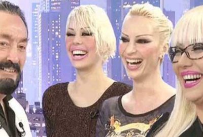 Kediciklerine altından sofra donattı