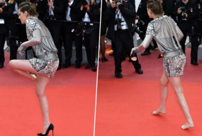 Kimseye aldırış etmedi! Kırmızı halıda ayakkabılarını çıkarıp yürüdü