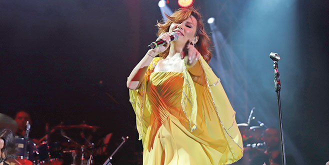 Kilolar gitti kıyafetlerini bağışladı