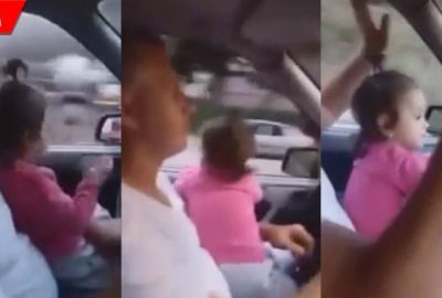 Kucağındaki bebekle araba kullandı