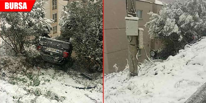 Karda kayan otomobil devrildi