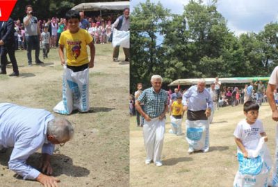 Torunlarıyla düşe kalka çuval yarışı yaptılar