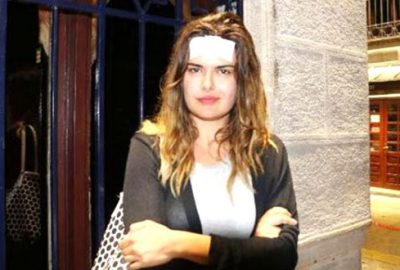 Bikinili görüntülerini çeken adama kafa atan sunucunun yeni adresi belli oldu