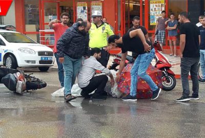 Yaralıyı şemsiye ve naylonla yağmurdan korudular