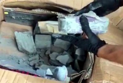 Kargo şirketinde paketleri açan polis gözlerine inanamadı