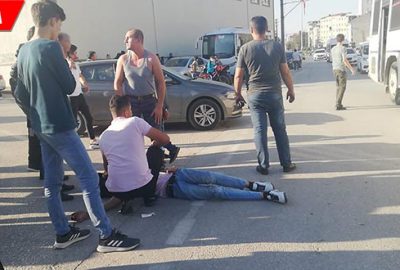 Otomobil ile motosikletin arasında kalan yaya ölümden döndü