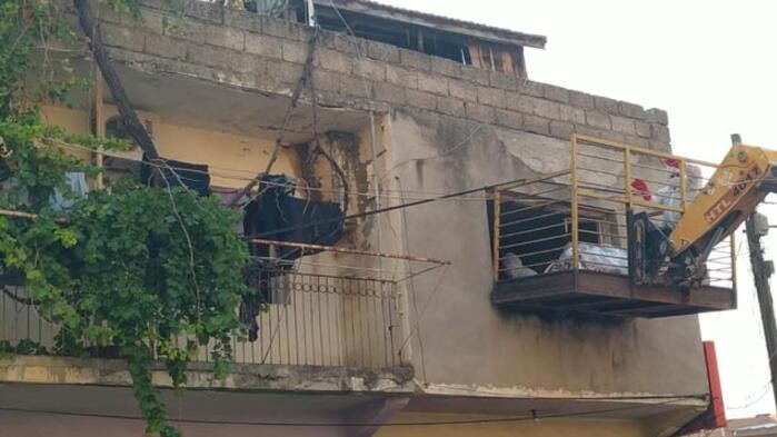 Hayatını kaybetti evinden kepçeyle çıkarıldı