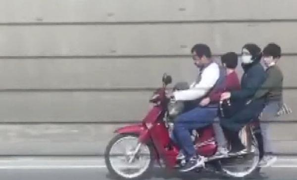 Bursa’da tehlikeli yolculuk! 5 kişi aynı motosiklette