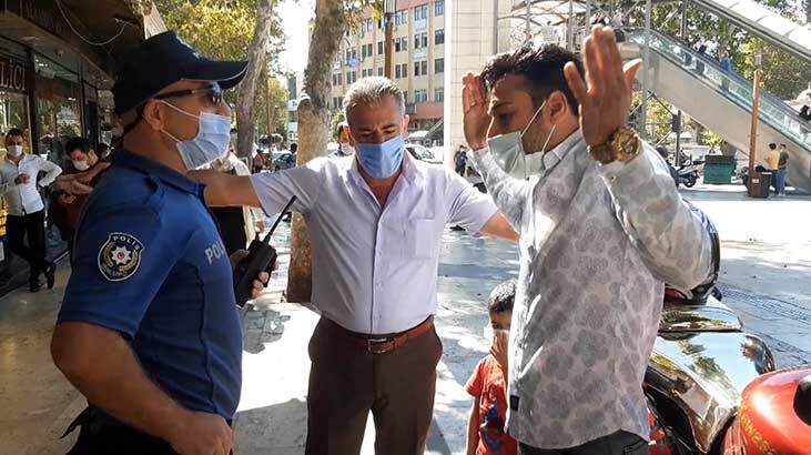 Maske denetiminde kimlik isteyen polise direndi, arandığı ortaya çıktı