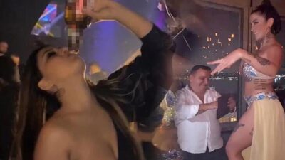 Skandal parti! Dansözü masalara çıkartıp oynattılar