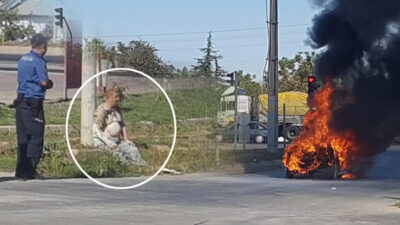 Alev topuna dönen otomobilden son anda kurtarıldı