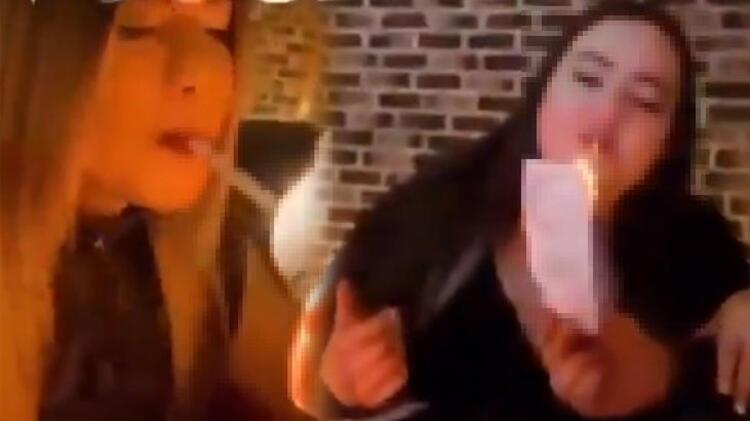 Tepki çeken görüntüler! Türk lirasını ateşe verip sigara yaktılar