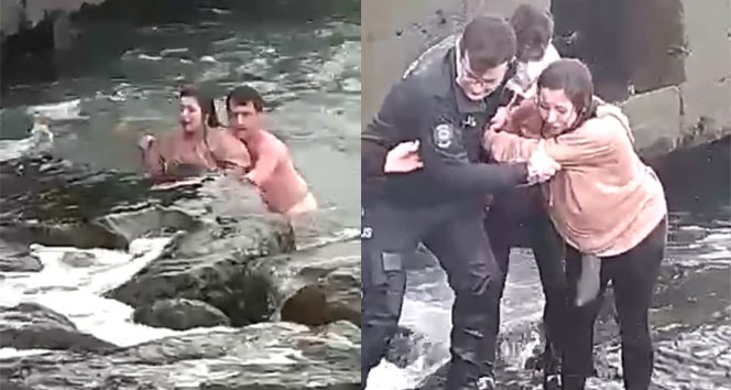 Denize düşen genç kız için buz gibi suya böyle atladı