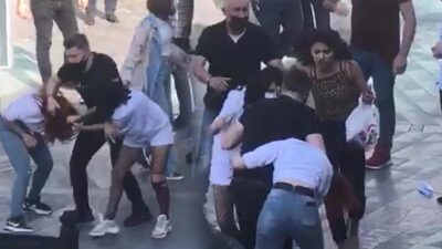 Kızlar cadde ortasında saç saça baş başa kavga etti