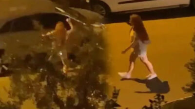 Genç kadın çılgına döndü! Hıncını otomobilden çıkardı