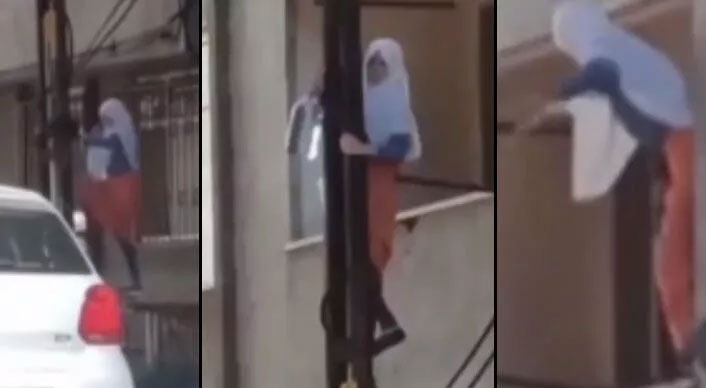 İlginç olay! Bir kadın günde 50 kez evine elektrik direğine tırmanarak giriyor
