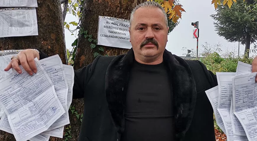 2 bin 493 TL’lik ‘işgal’ cezasının makbuzlarını ağaca astı