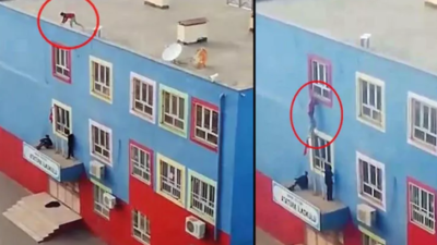 Okulda tehlikeli anlar! Çatıdan pencerelere tutunarak indi