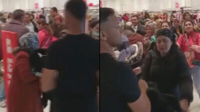 Mağazada indirimli kıyafet izdihamı