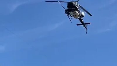 Bursa’da yüksek gerilim hatları helikopterle temizlendi