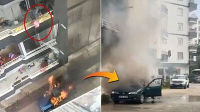 Yanan araca, balkondan kova ile su dökerek müdahale etti