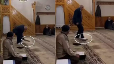 Kur’an-ı Kerim’i 3 kez kez öptü, sonra ayağıyla bastı! Tepki çeken görüntü için karar