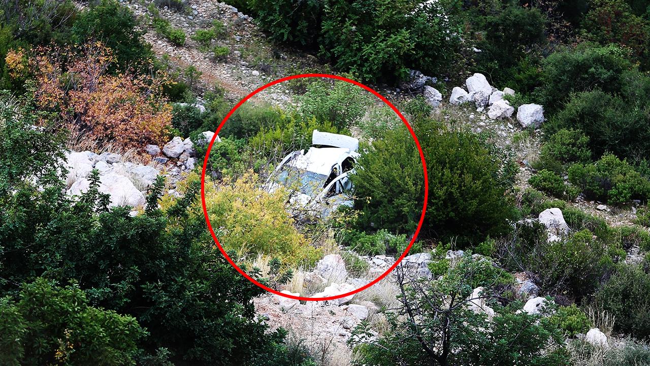 Eşiyle tartışıp otomobilini uçuruma yuvarladı