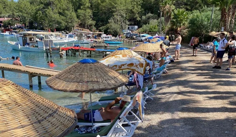 Akbük sahili halka açıldı: Bir tek otopark için ücret alınacak Akbük sahili halka açıldı: Bir tek otopark için ücret alınacak