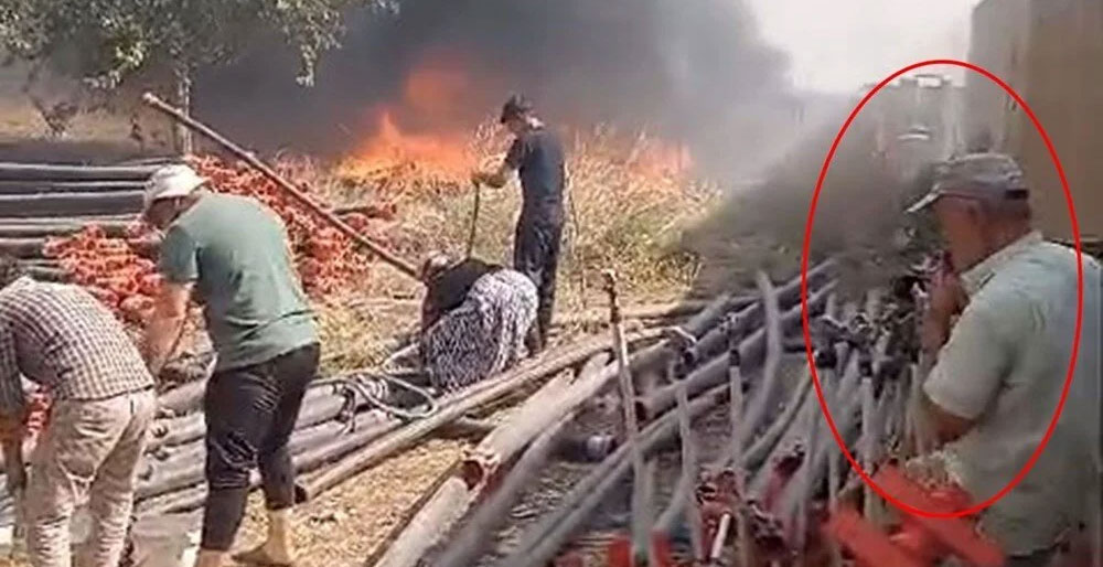 Mardin’de şaşkına çeviren görüntü! Ağzında sigarayla yangın söndürdü