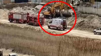 Bursa’da istinat duvarı iş makinasının üzerine devrildi