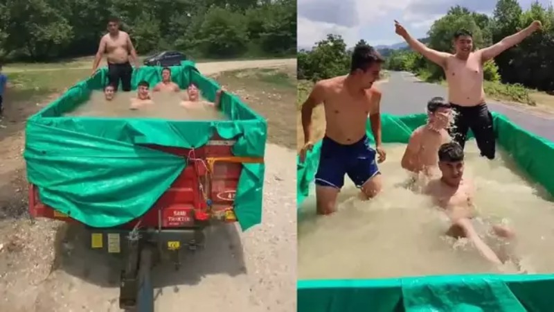 Bursa’da traktör römorkunu havuza çevirip serinlediler