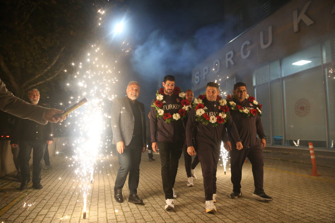 Bursagücü’nün olimpiyat ve dünya şampiyonlarına meşaleli karşılama