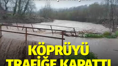 Bursa’nın Gemlik ilçesinde aşırı yağışlar sebebiyle taşan dere yüzünden yol