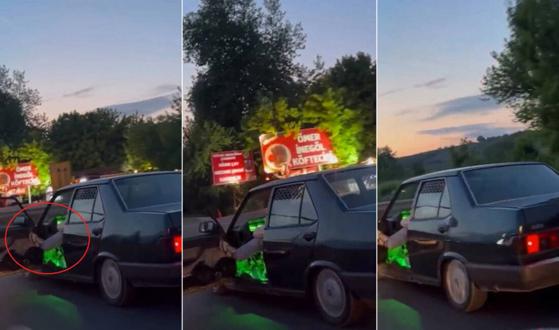 Bursa’da akıl almaz görüntüler Bursa’nın İnegöl ilçesinde otomobilinin sol ön kapısını açıp, ayağıyla tutarak