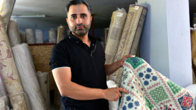 Adana’da, halı yıkamacı Mehmet Emin Evşin, müşterisinden yıkamak için aldığı