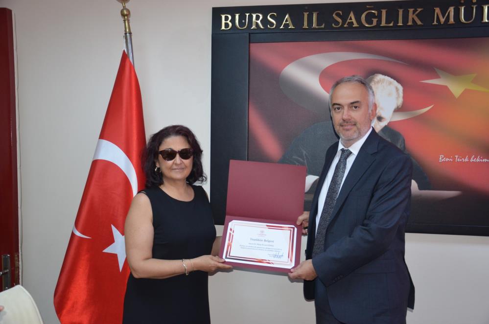 Bursa'nın kanserle mücadelede başarılı hekimlerine teşekkür belgesi 2 aw74382902
